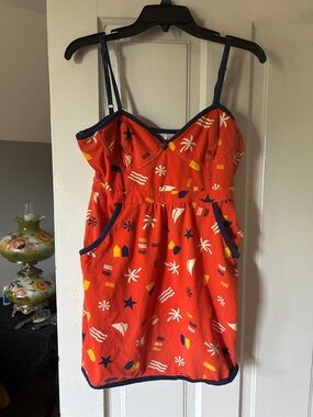 Women’s orange Patterned Sundress with Navy Trim and pockets